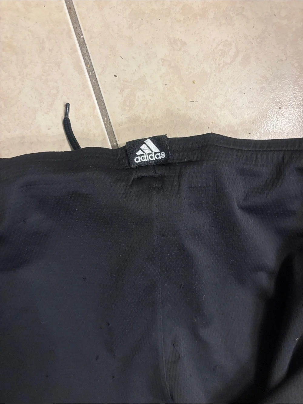 Adidas Black Athletic Shorts with Yellow Stripes